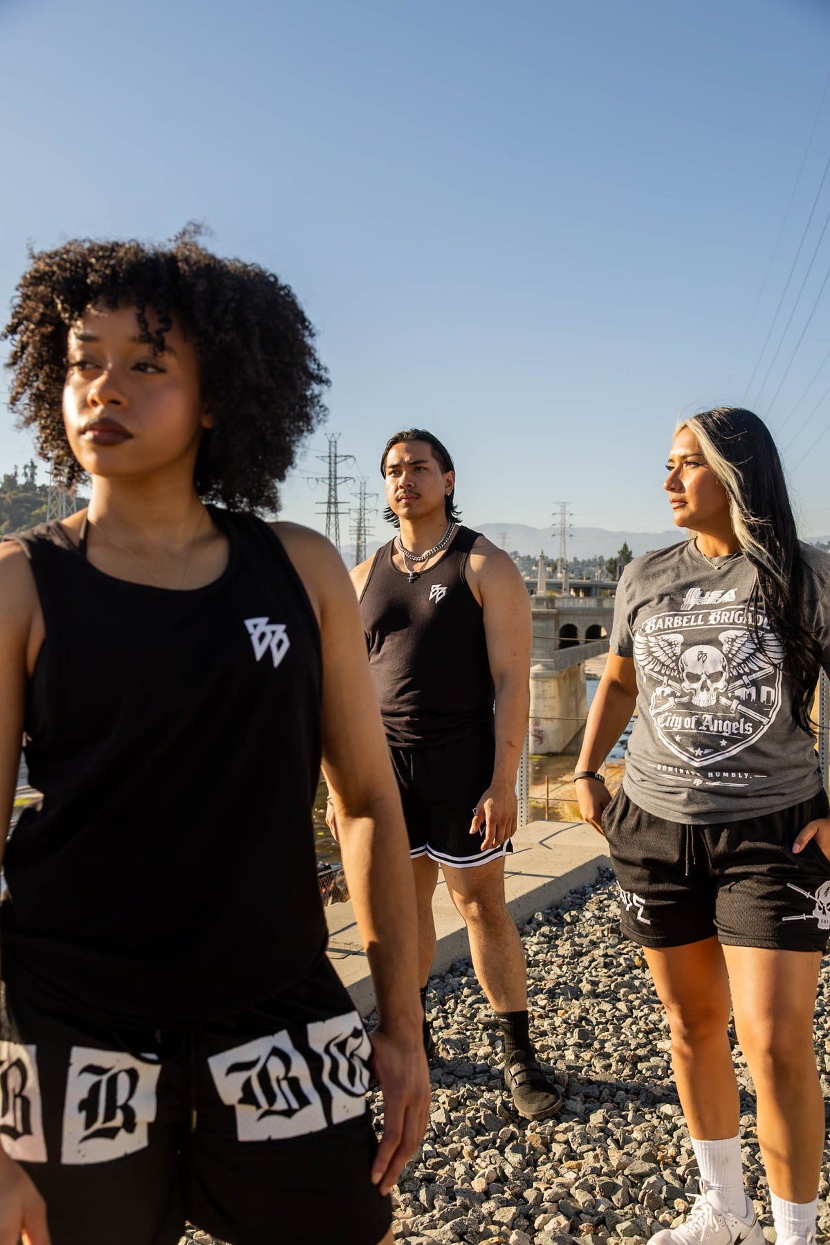 Barbell Brigade members wearing BB tanks outdoors